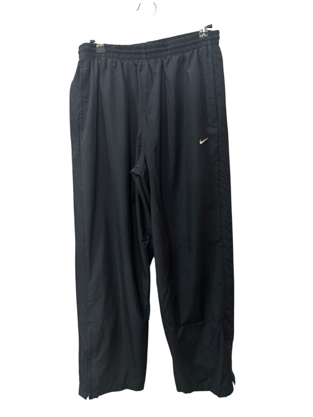 Nike track pants, typically featuring a solid blue color mens size M
